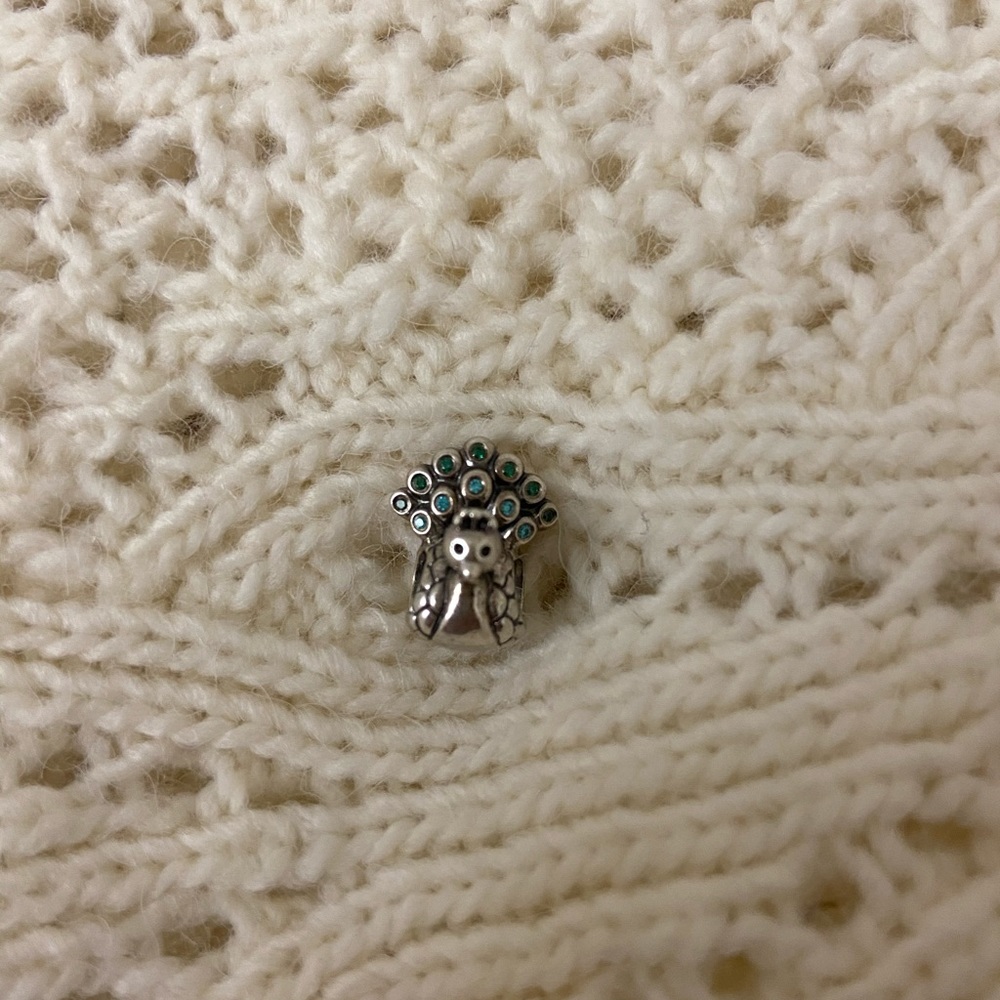 Pandora peacock charm